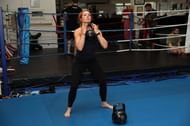 Lynch lifts some kettlebells
